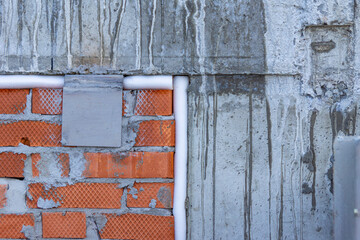 the connection of the monolithic structure of the building with the brickwork of the structure is sealed with a closed-cell joint sealant, selective focus