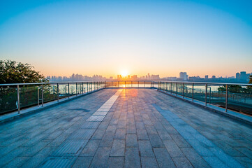 Obraz premium Sunrise view of marble square in Nanchang city, Jiangxi, China
