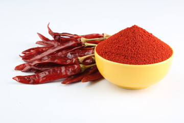 Indian spice Red chilli powder in yellow ceramic bowl