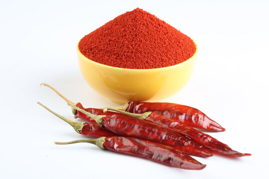 Indian spice Red chilli powder in yellow ceramic bowl