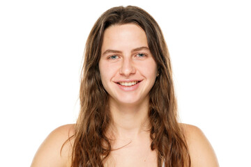 Portrait of a young smiling woman without makeup on a white background