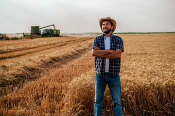 Portrait of farmer while harvesting is taking place.