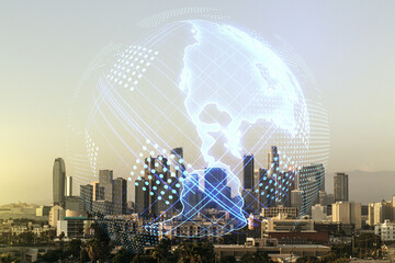 Fototapeta na wymiar Double exposure of digital map of North America hologram on Los Angeles city skyscrapers background, research and strategy concept