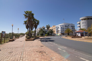Promenade on the beach of Isla Cristina, Huelva, Spain.