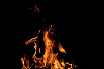 Close up burning flames on black background for graphic design or wallpaper