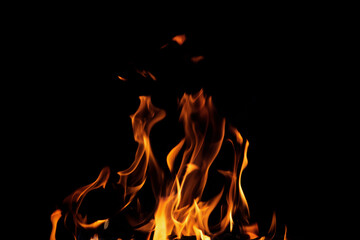 Fototapeta premium Close up burning flames on black background for graphic design or wallpaper