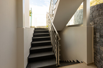 Stairs with aluminum handrails in a hotel