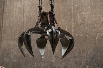 Dirty mechanical claw hand grabbing waste , Waste energy power plant.
