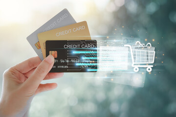 Woman hand holding various credit cards to pay for shopping. Online shopping payment by credit card...