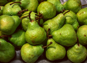 green apples just brought from the farm displayed for sale during the holy month of Ramadan - obrazy, fototapety, plakaty