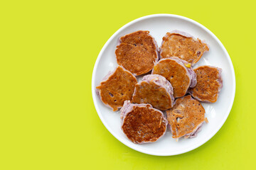 Coconut pancake on white background.