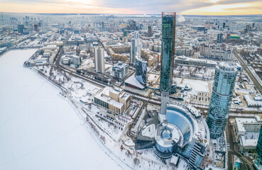 Yekaterinburg aerial panoramic view in Winter at sunset. Yekaterinburg city and pond in winter.