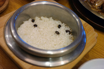 White rice is made in stone pot rice.
