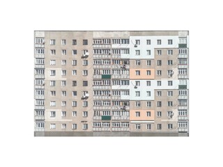 Old Soviet prefabricated nine-storey panel apartment building, isolated on white.