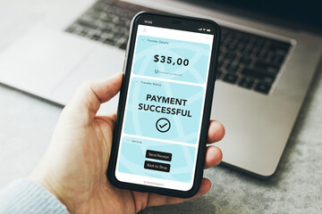 Man paying with smartphone for online shopping. Paying using fast secure payment system. Paying...