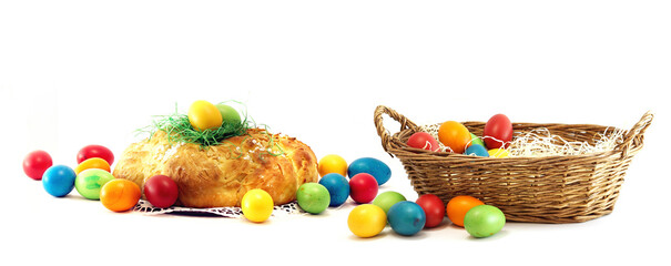 basket with easter eggs with homemade Bavarian Hefezopf challah yeast pastries bread plait isolated