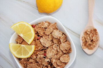dry diet muesli and yellow lemon slices
