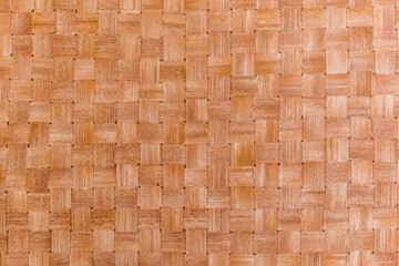 Rustic wicker texture basket. Horizontal and vertical lines. Ocher and brown tones background photo