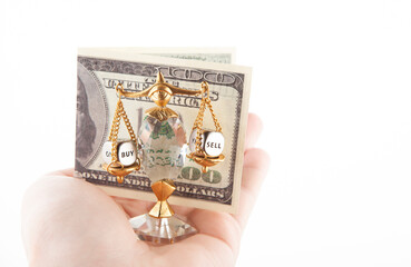 image of miniature scale money hand white background