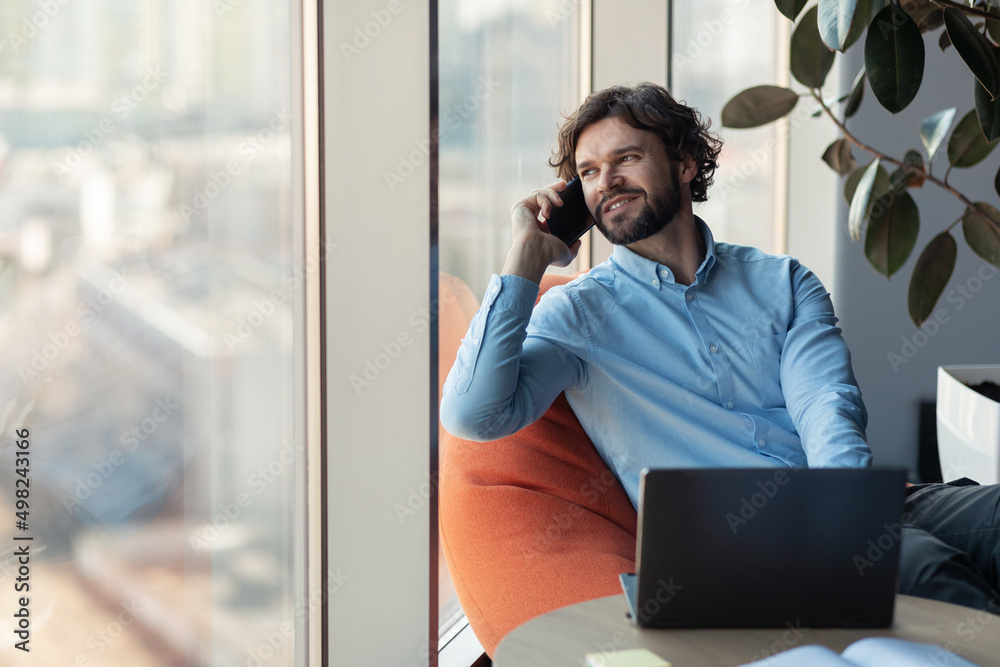 Sticker Smiling business man working and talking on phone at office