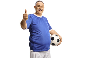 Cheerful mature man in a football jersey holding a ball and gesturing thumbs up