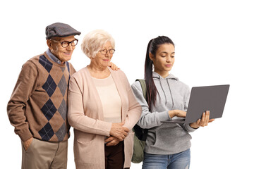 Fototapeta premium Student showing a laptop computer to an elderly man and woman