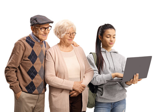 Student showing a laptop computer to an elderly man and woman