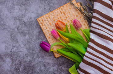 Pesach celebration holiday the flowers matzah bread with Jewish Passover