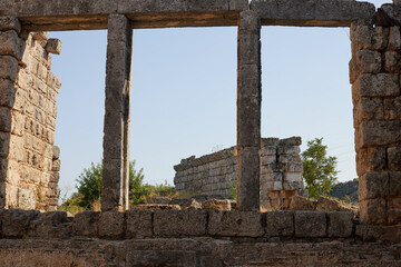 Roman ancient ruins Perge over a blue sky in Turkey, Antalya.