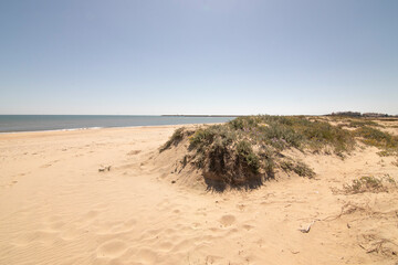 Isla Cristina beach, Huelva, Spain. A blue sky and fine sand. Concept of the best beaches.