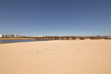 A wooden walkway, on the beach of Isla Cristina, Spain. Widely used by vacationers on vacation.