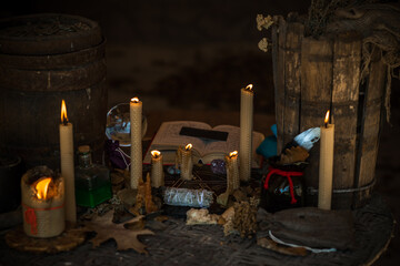 Mystical scene with a candle, ritual, clear dark energy, rituals for money, luck, love