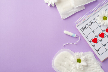 Obraz na płótnie Canvas Top view photo of red heart marks on the calendar period pads tampon and camomile buds on isolated pastel violet background with copyspace