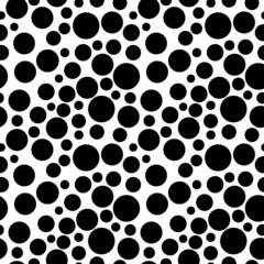 Seamless Dots pattern. Black vector dots design on White background. Trendy circles pattern in different sizes. Fashionable pattern for textiles and interior design. Scattered polka dots design.