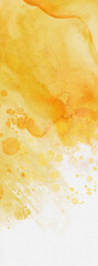 Abstract gold and yellow watercolor paint background.