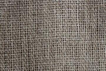 Brown burlap background or sack cloth for packing. Close up or macro shooting.