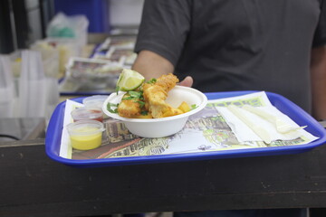 Grilled fish served with a slice of lemon 