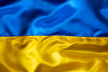 Silk waving Ukrainian national flag background