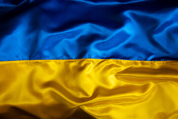 Silk waving Ukrainian national flag background