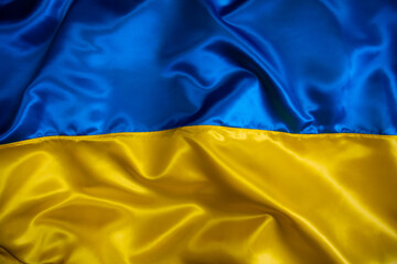 Silk waving Ukrainian national flag background