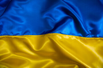 Silk waving Ukrainian national flag background