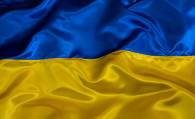 Silk waving Ukrainian national flag background