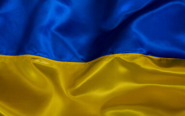 Silk waving Ukrainian national flag background