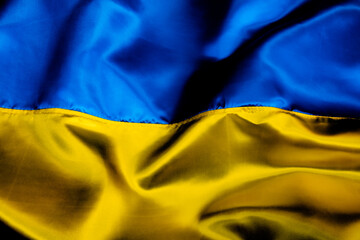Silk waving Ukrainian national flag background