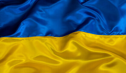 Silk waving Ukrainian national flag background