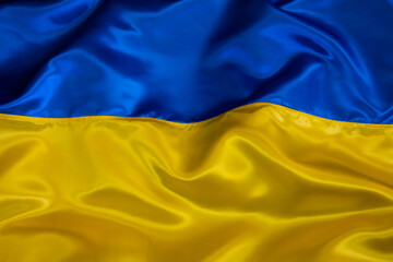 Silk waving Ukrainian national flag background