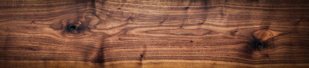 Wood texture background. Walnut wood plank natural texture. Panoramic wood plank texture background. Long plank texture background. Panoramic background elements.	
