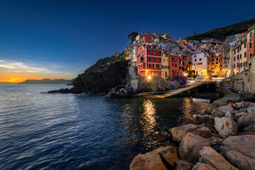 Fototapeta na wymiar Riomaggiore at sunset Cinque Terre, Italy