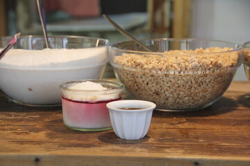 Malabi served with nuts and coconut shavings 