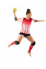Full length of biracial young female handball player in mid-air playing against white background